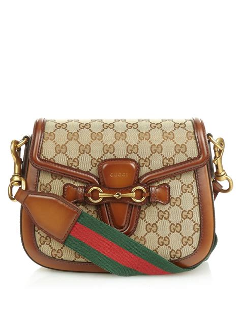 gucci canvas shoulder bag vintage|vintage gucci 145 shoulder bag.